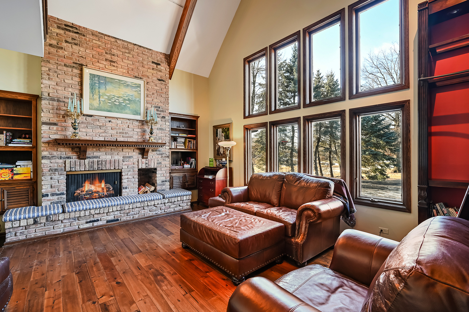 803 Merry Lane Oak Brook, IL 60523 - Photo 11 of 39 a living room with furniture large window and a fireplace