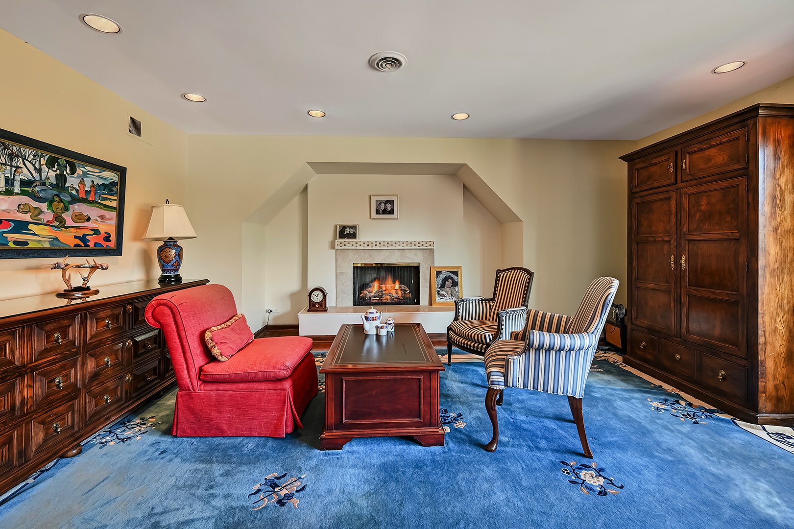 803 Merry Lane Oak Brook, IL 60523 - Photo 17 of 39 a living room with furniture a fireplace and a flat screen tv