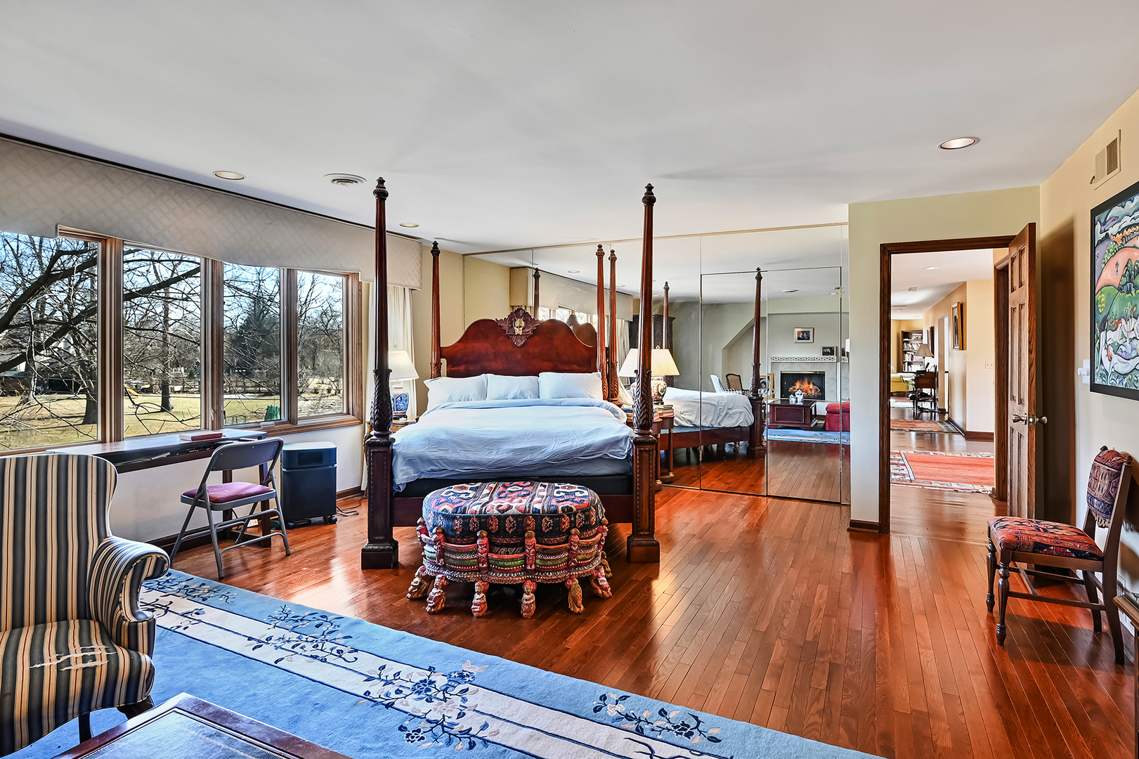 803 Merry Lane Oak Brook, IL 60523 - Photo 18 of 39 a living room with furniture a wooden floor and next to a large window
