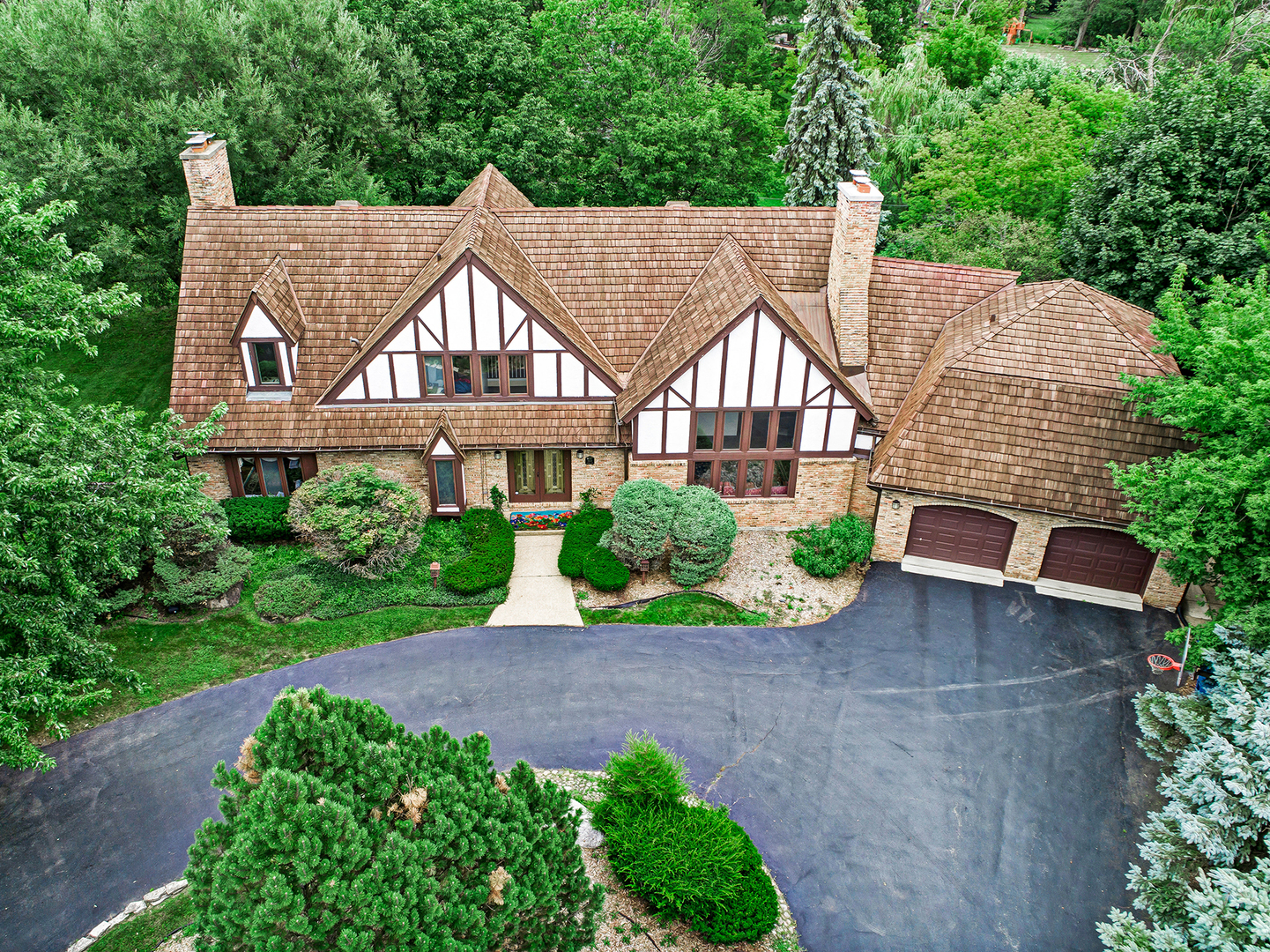 803 Merry Lane Oak Brook, IL 60523 - Photo 2 of 39 a aerial view of a house next to a yard