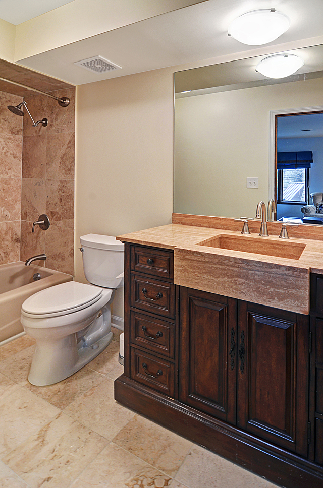 803 Merry Lane Oak Brook, IL 60523 - Photo 26 of 39 a bathroom with a granite countertop toilet sink and mirror