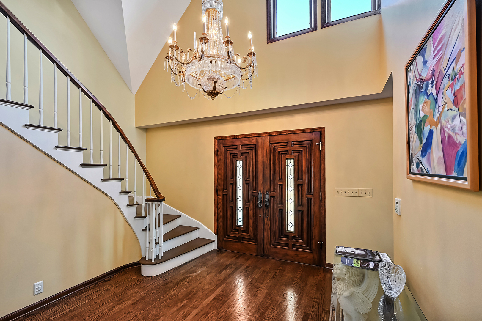 803 Merry Lane Oak Brook, IL 60523 - Photo 3 of 39 a view of a hallway with wooden floor and staircase