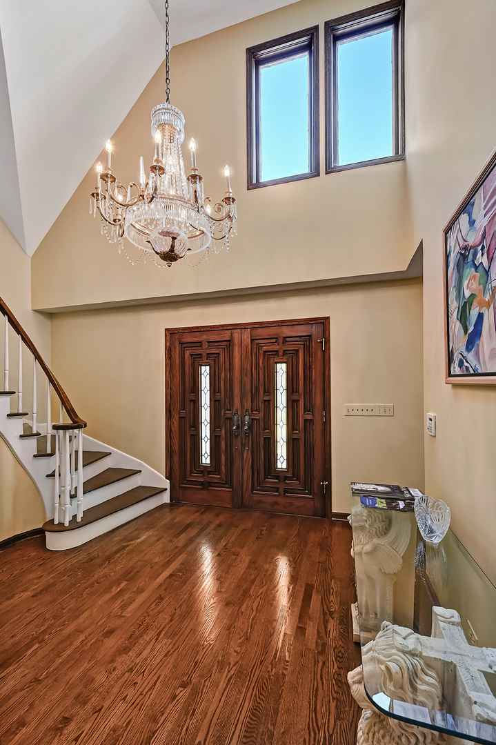 803 Merry Lane Oak Brook, IL 60523 - Photo 4 of 39 a living room with hard wood flooring and furniture