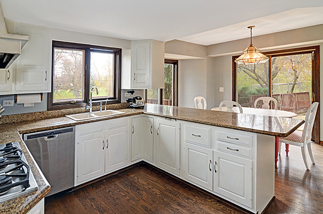803 Merry Lane Oak Brook, IL 60523 - Photo 8 of 39 a spacious bathroom with double vanity and a mirror