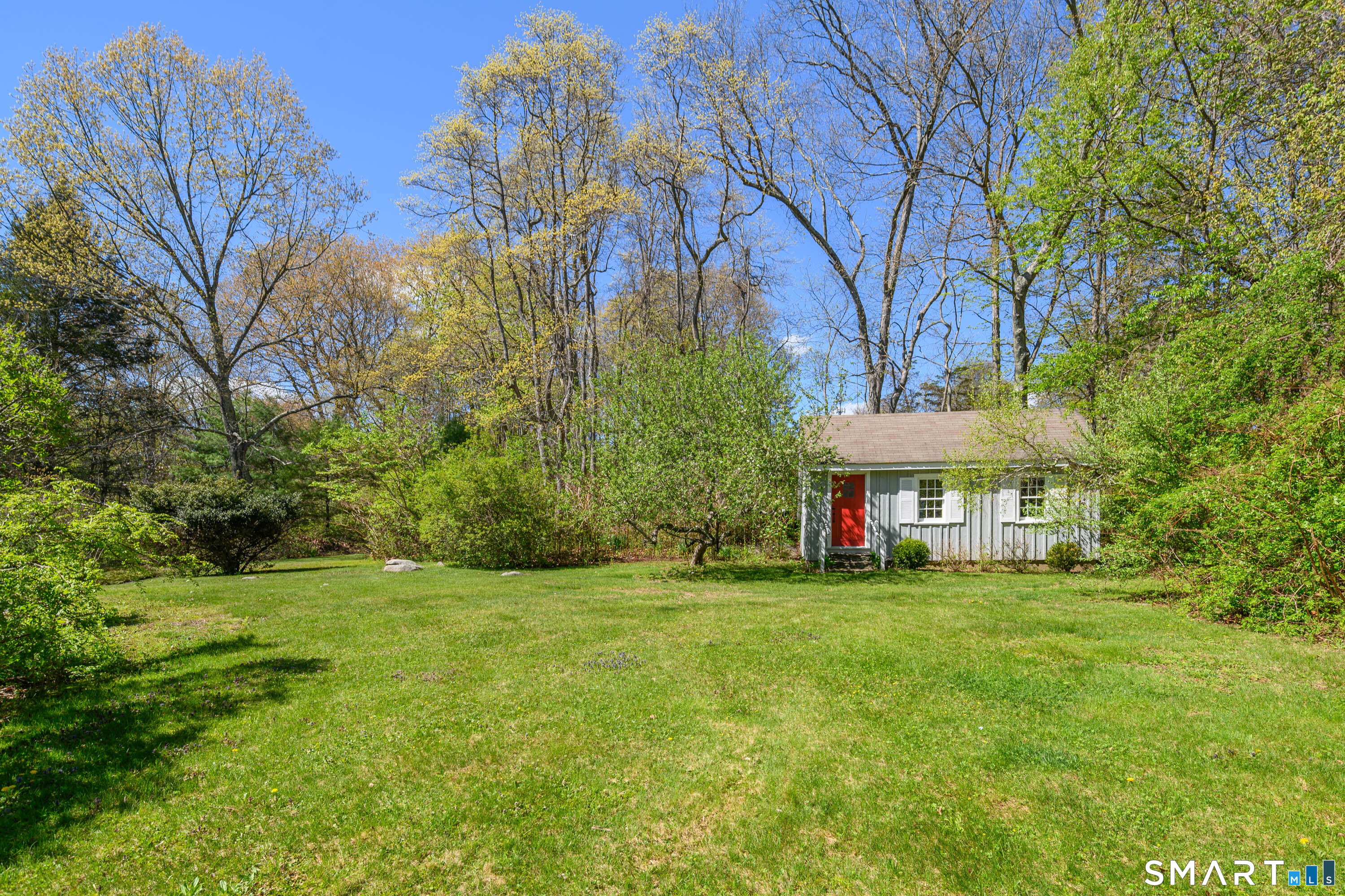 6 High Rock Road Newtown, CT 06482 - Photo 29 of 40 a view of a house with a big yard and large trees