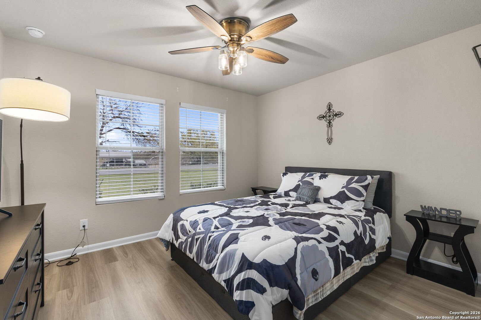 20825 Pleasanton Road San Antonio, TX 78264 - Photo 14 of 33 a large bed sitting in a bedroom next to a window