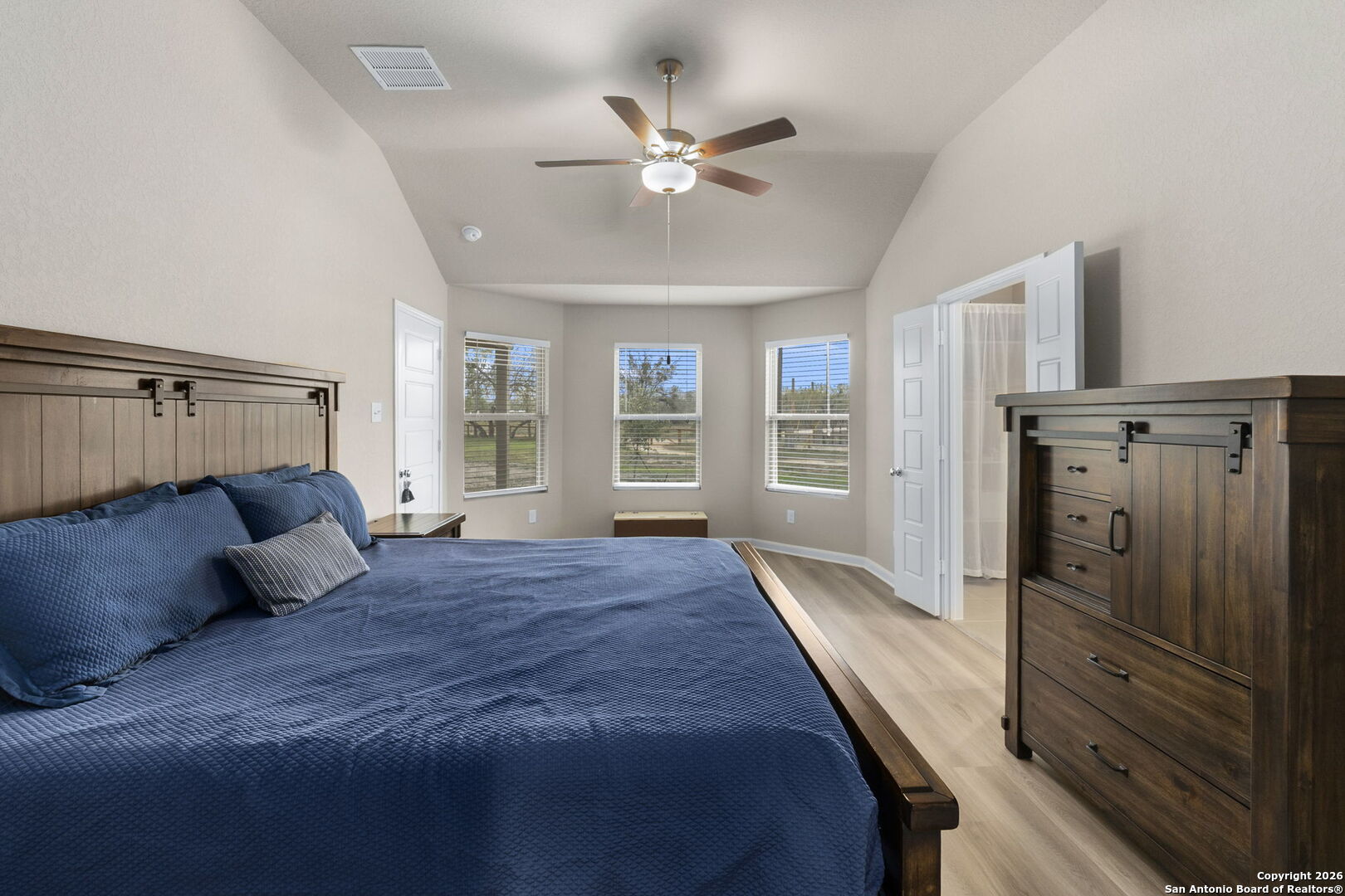 20825 Pleasanton Road San Antonio, TX 78264 - Photo 16 of 33 a bed room with a bed and a window