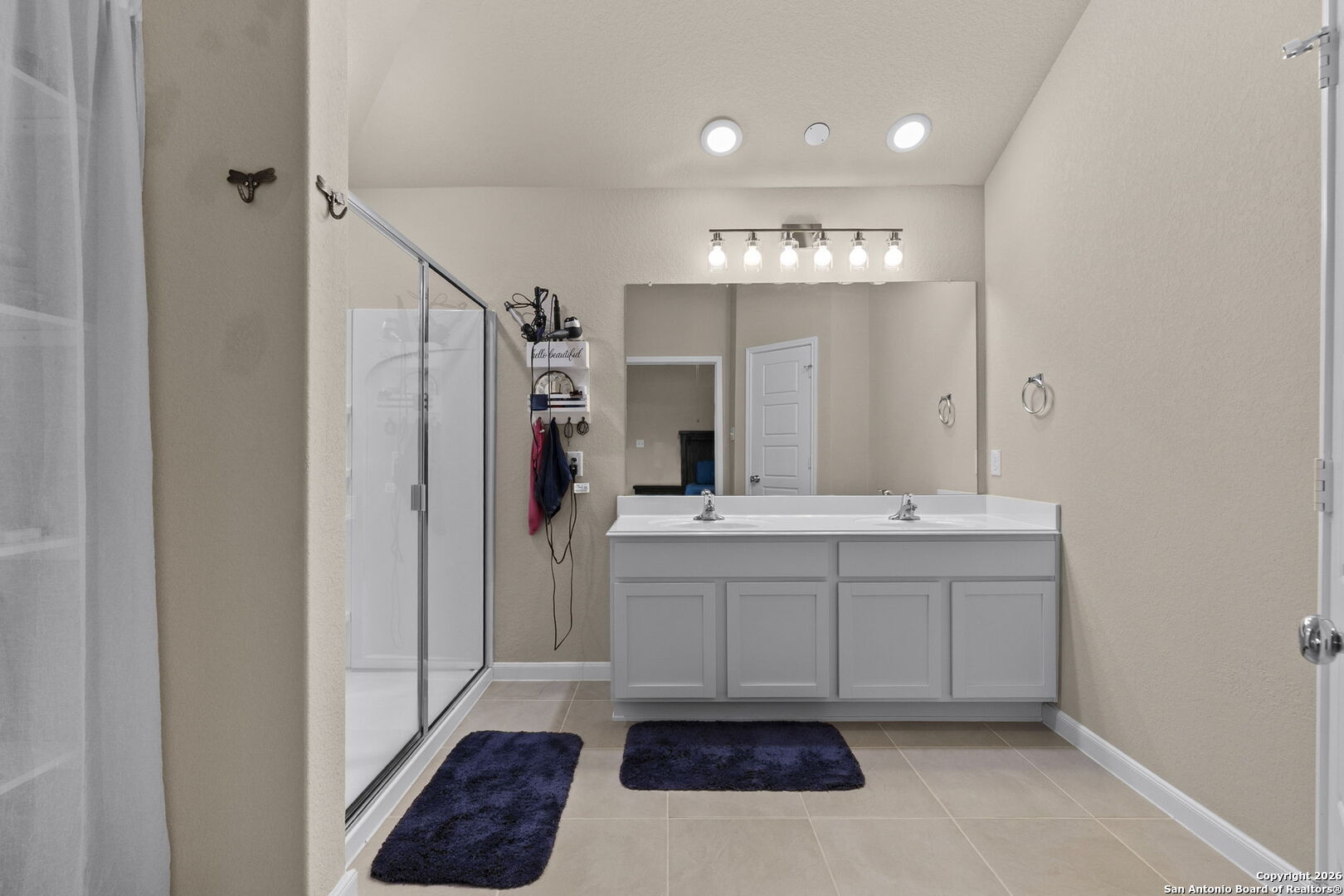 20825 Pleasanton Road San Antonio, TX 78264 - Photo 18 of 33 a bathroom with a sink a toilet and a mirror