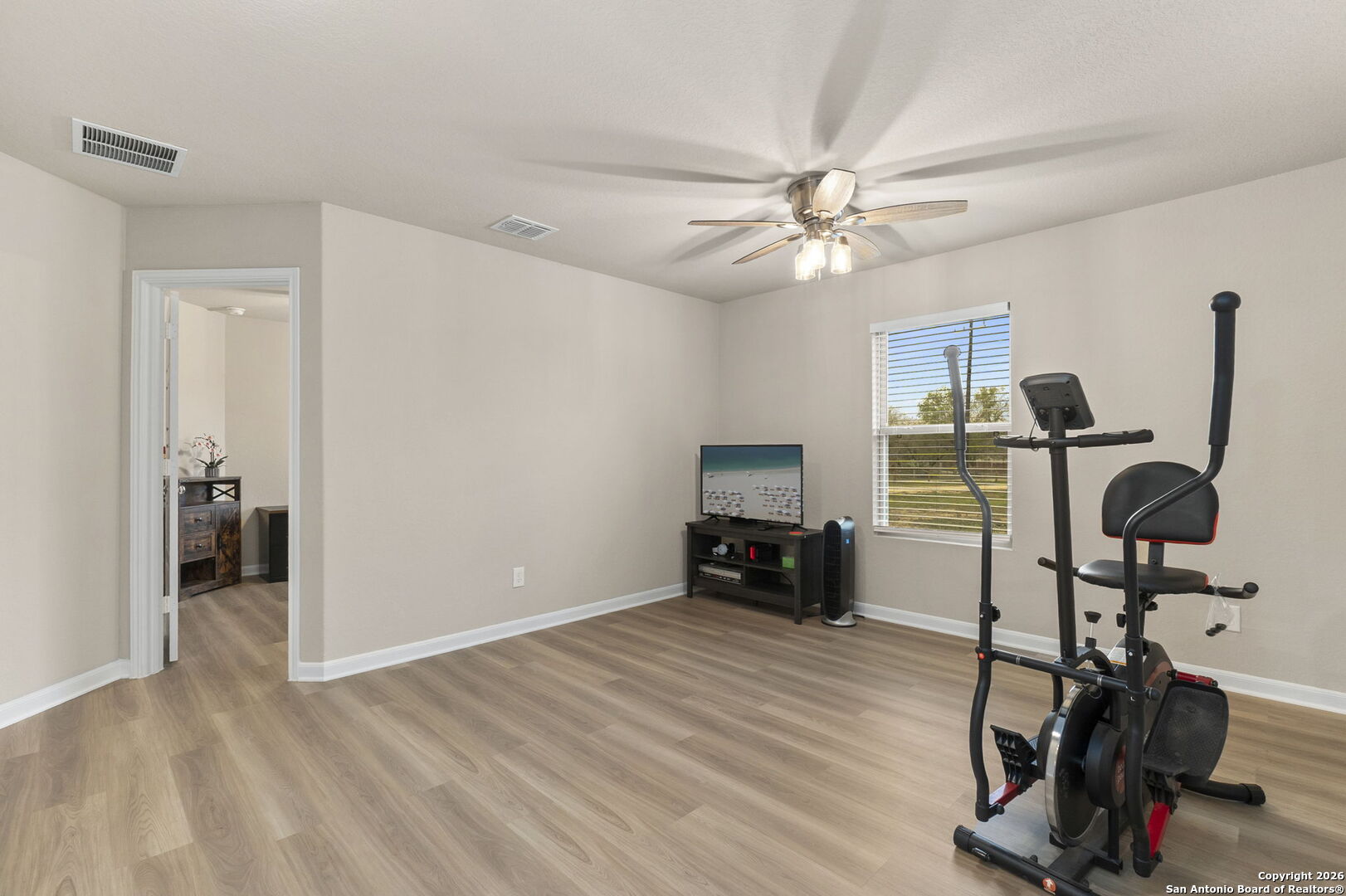 20825 Pleasanton Road San Antonio, TX 78264 - Photo 22 of 33 a view of a workspace with furniture and gym equipment