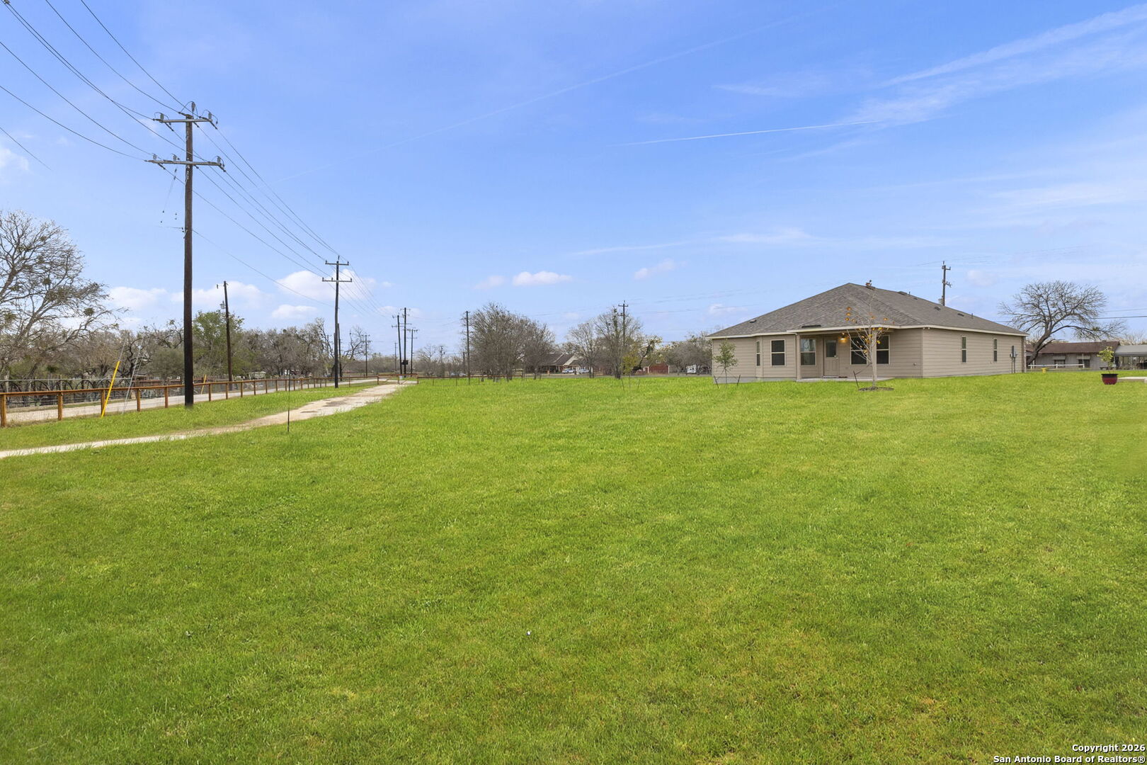 20825 Pleasanton Road San Antonio, TX 78264 - Photo 26 of 33 a view of a field with a big yard and palm trees