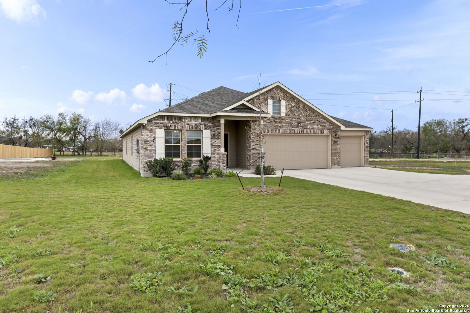 20825 Pleasanton Road San Antonio, TX 78264 - Photo 33 of 33 a front view of a house with garden