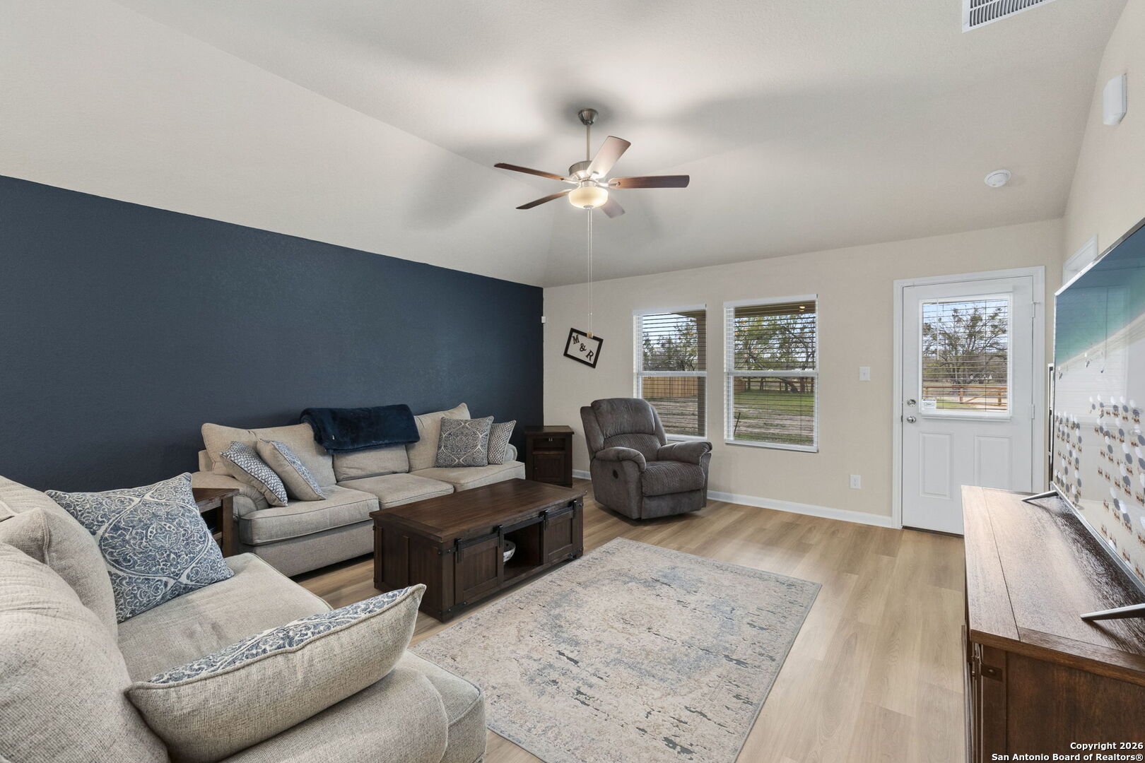 20825 Pleasanton Road San Antonio, TX 78264 - Photo 10 of 33 a living room with furniture and a flat screen tv