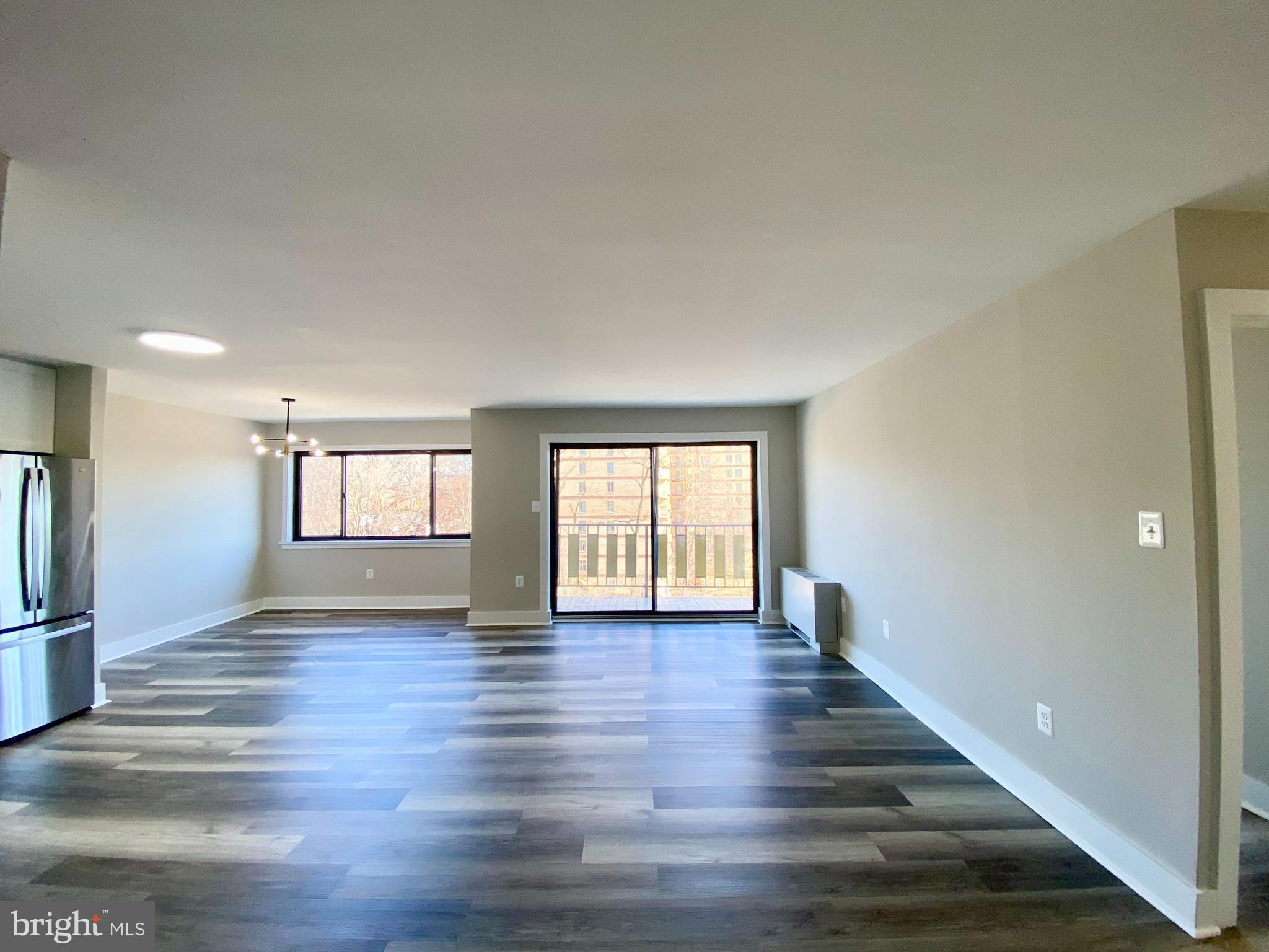 8830 Piney Branch Road, Unit 507 Silver Spring, MD 20903 - Photo 2 of 42 family room, new convector