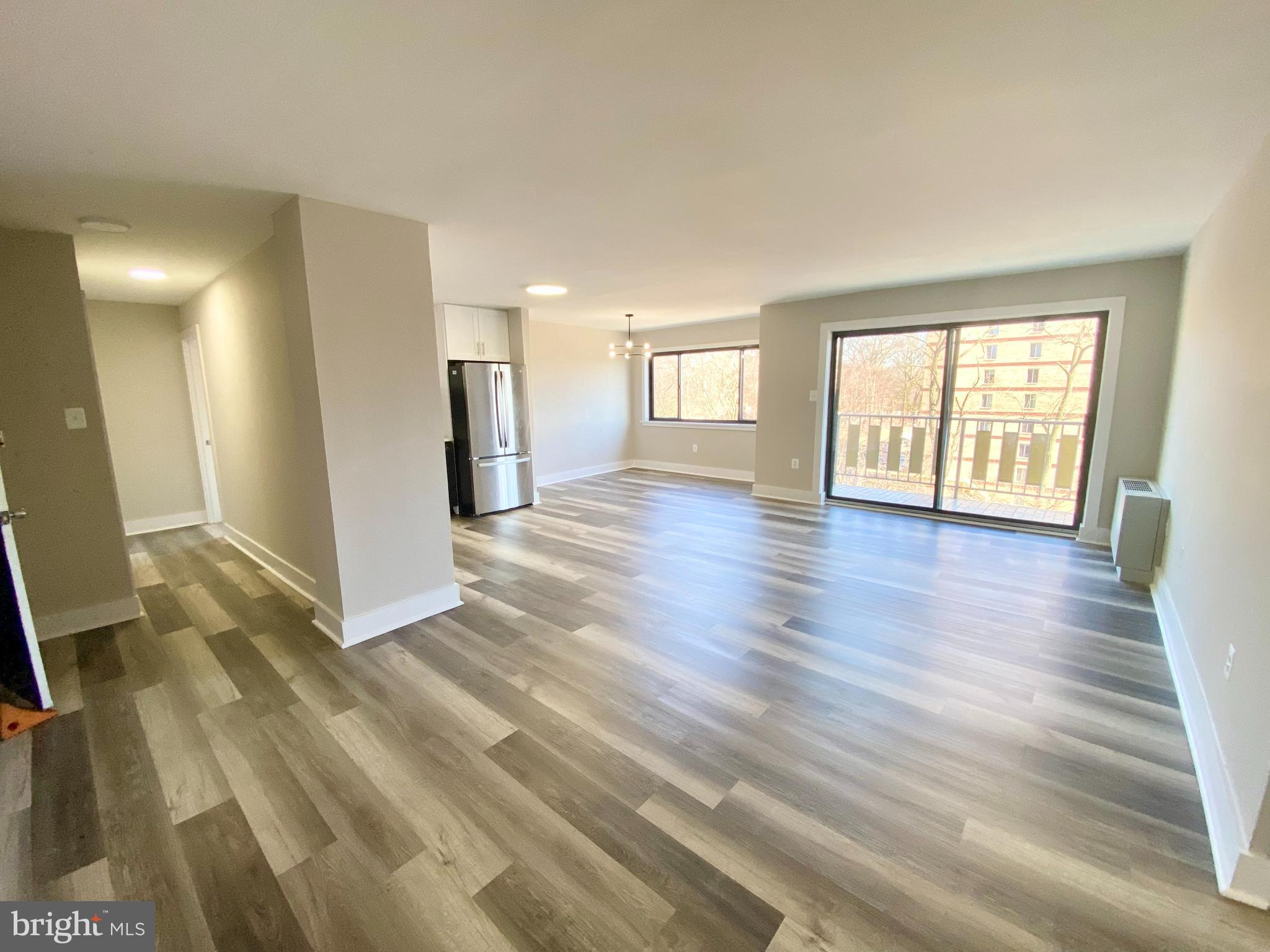 8830 Piney Branch Road, Unit 507 Silver Spring, MD 20903 - Photo 3 of 42 family room, new convector