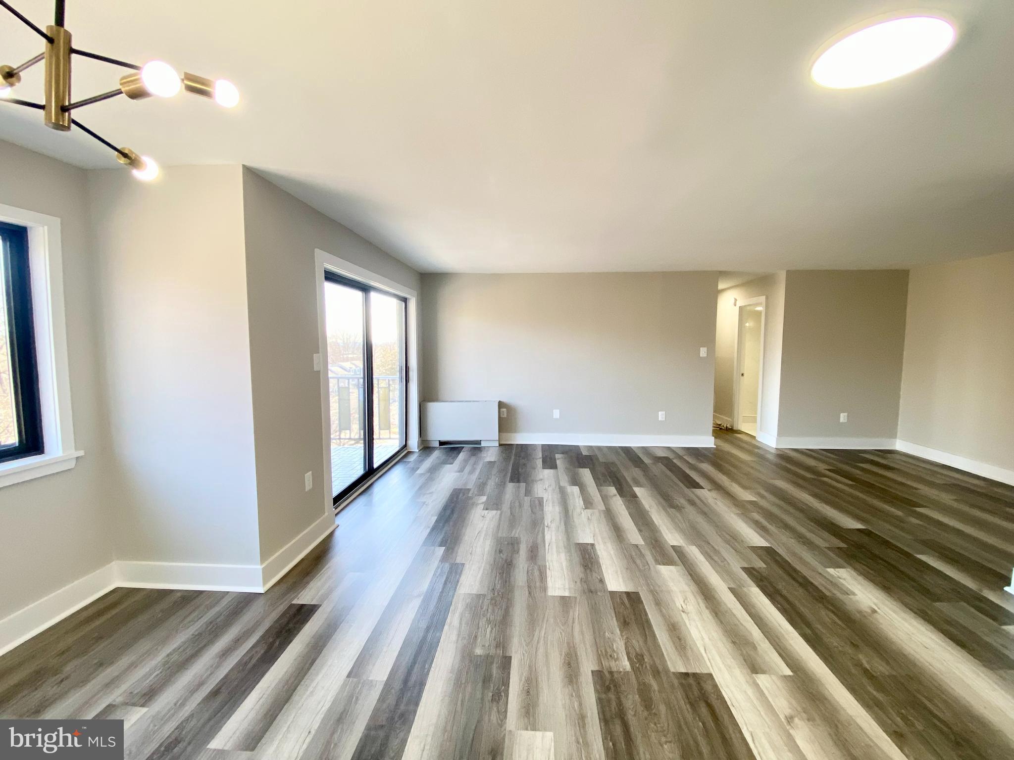 8830 Piney Branch Road, Unit 507 Silver Spring, MD 20903 - Photo 4 of 42 family room, new convector