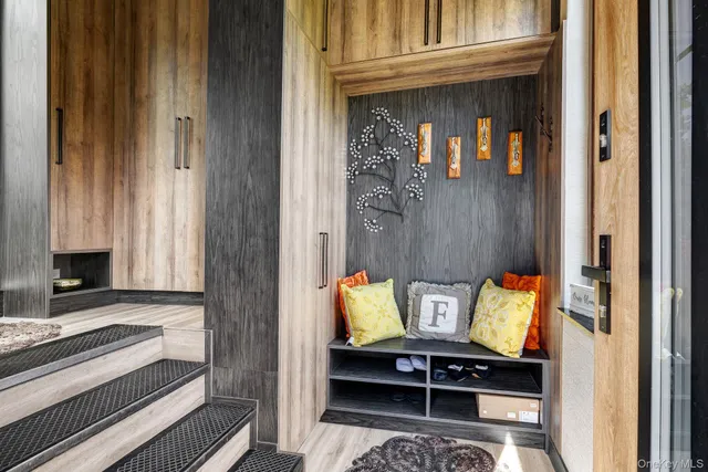 a view of living room with furniture and chandelier
