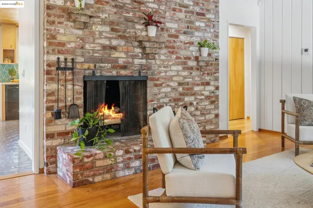 a living room filled with furniture and a table