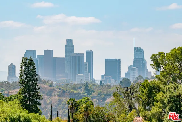 a city view with tall buildings