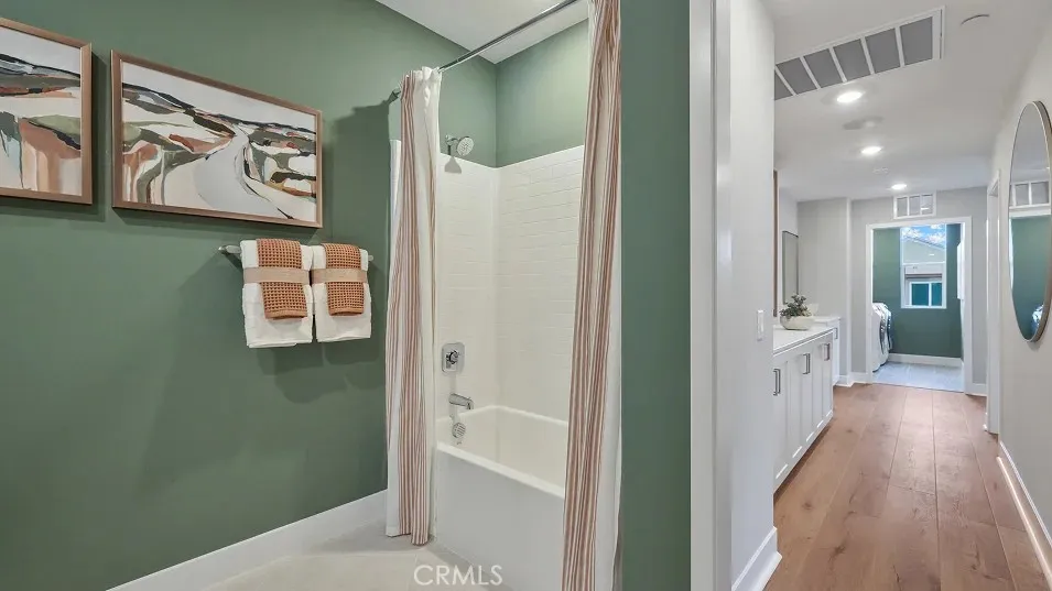 1723 Lychee Street Fullerton, CA 92835 - Photo 14 of 25 view of a hallway with wooden floor and windows