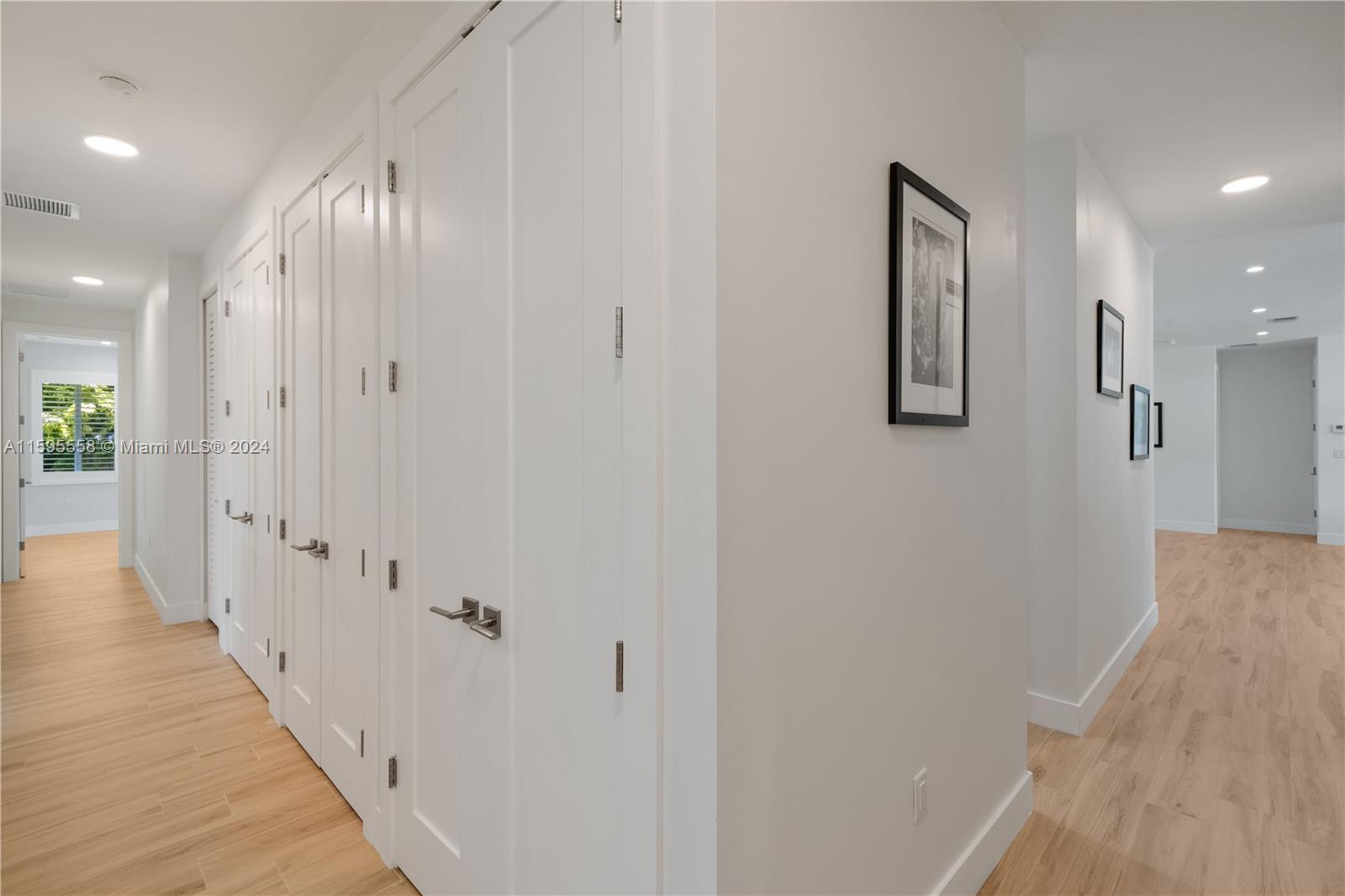 11815 Southwest 82nd Road Miami, FL 33156 - Photo 17 of 47 a view of a hallway with wooden floor