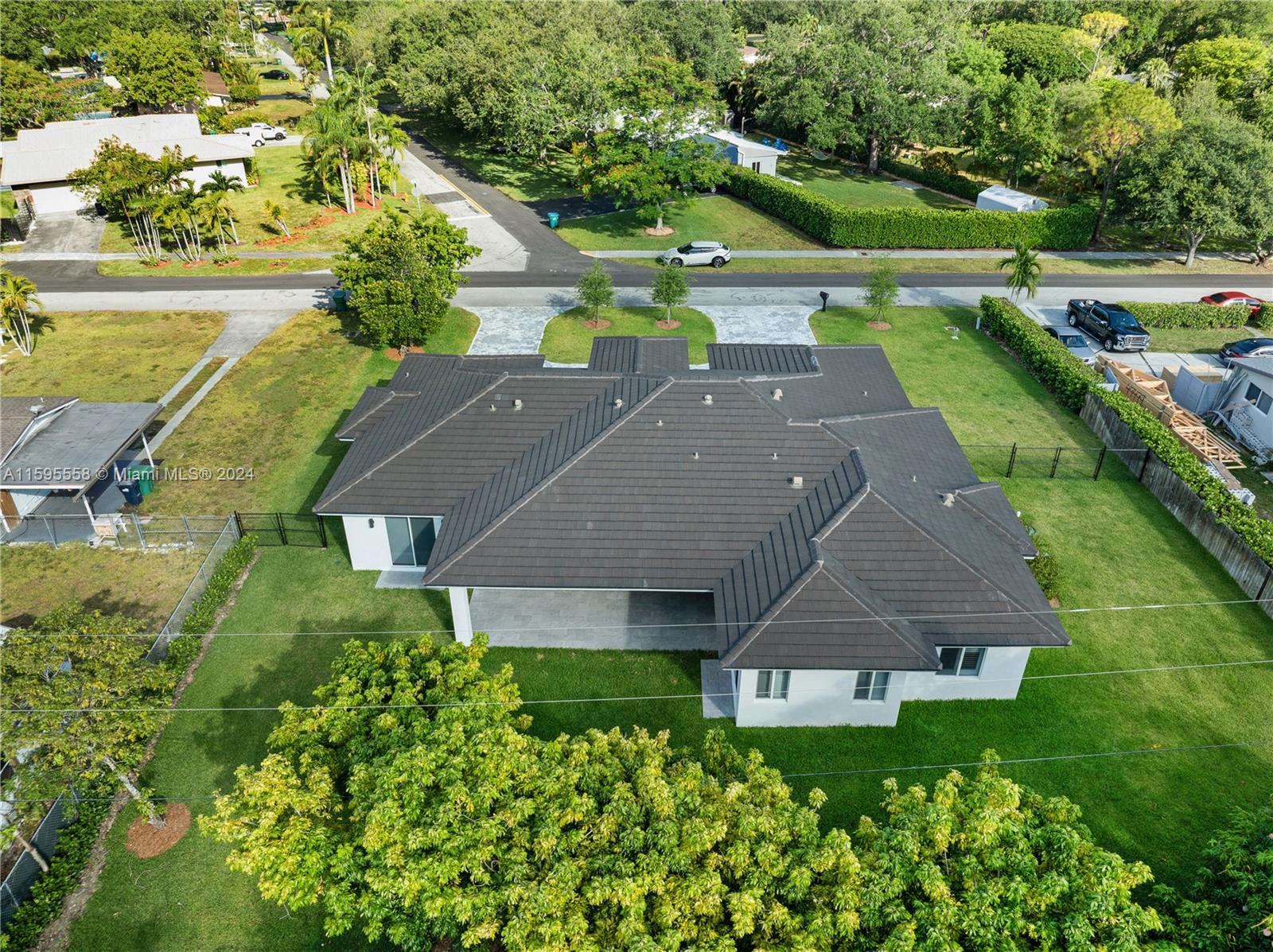 11815 Southwest 82nd Road Miami, FL 33156 - Photo 45 of 47 an aerial view of a house with a yard