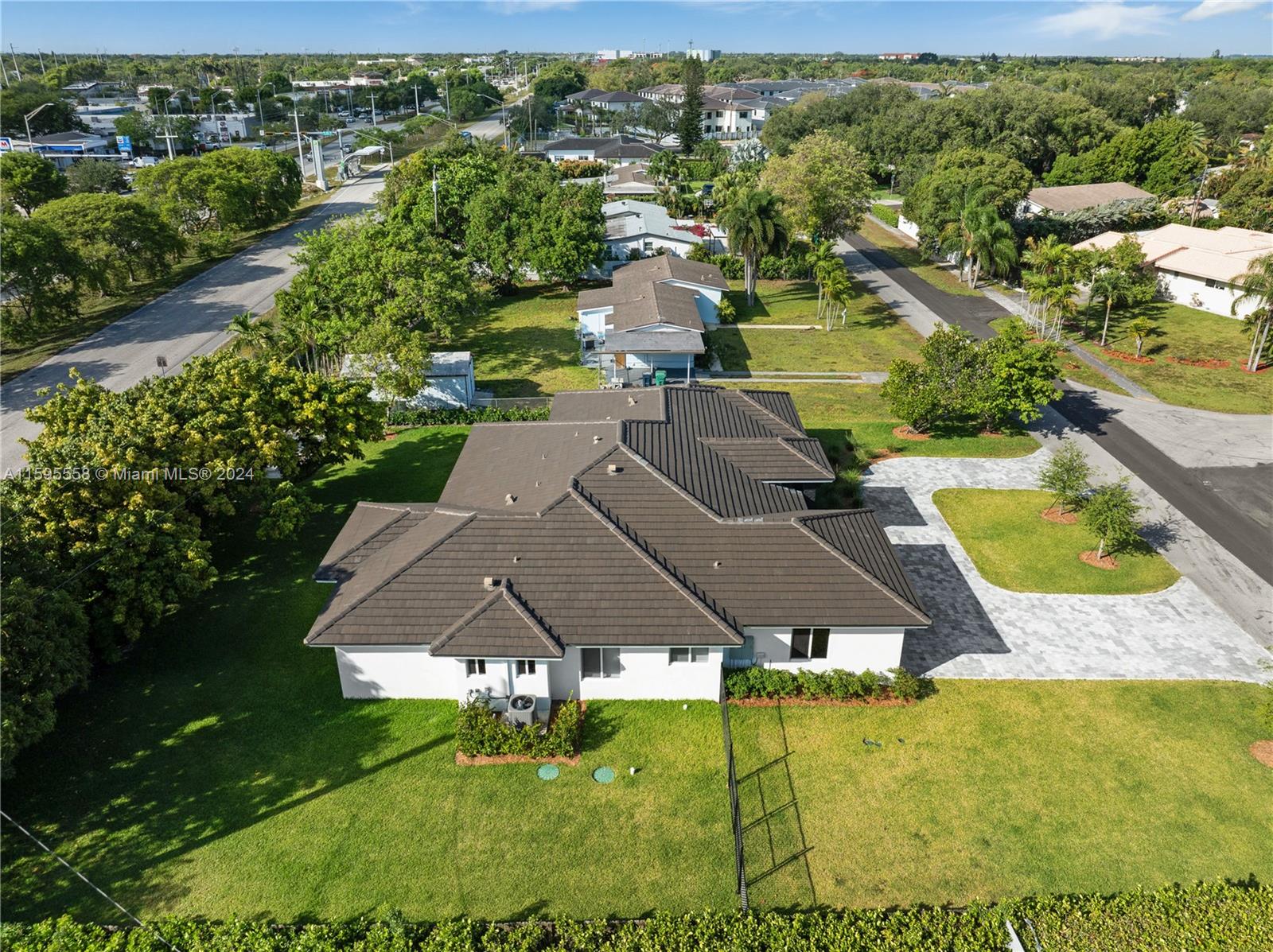 11815 Southwest 82nd Road Miami, FL 33156 - Photo 46 of 47 an aerial view of residential houses with outdoor space and trees