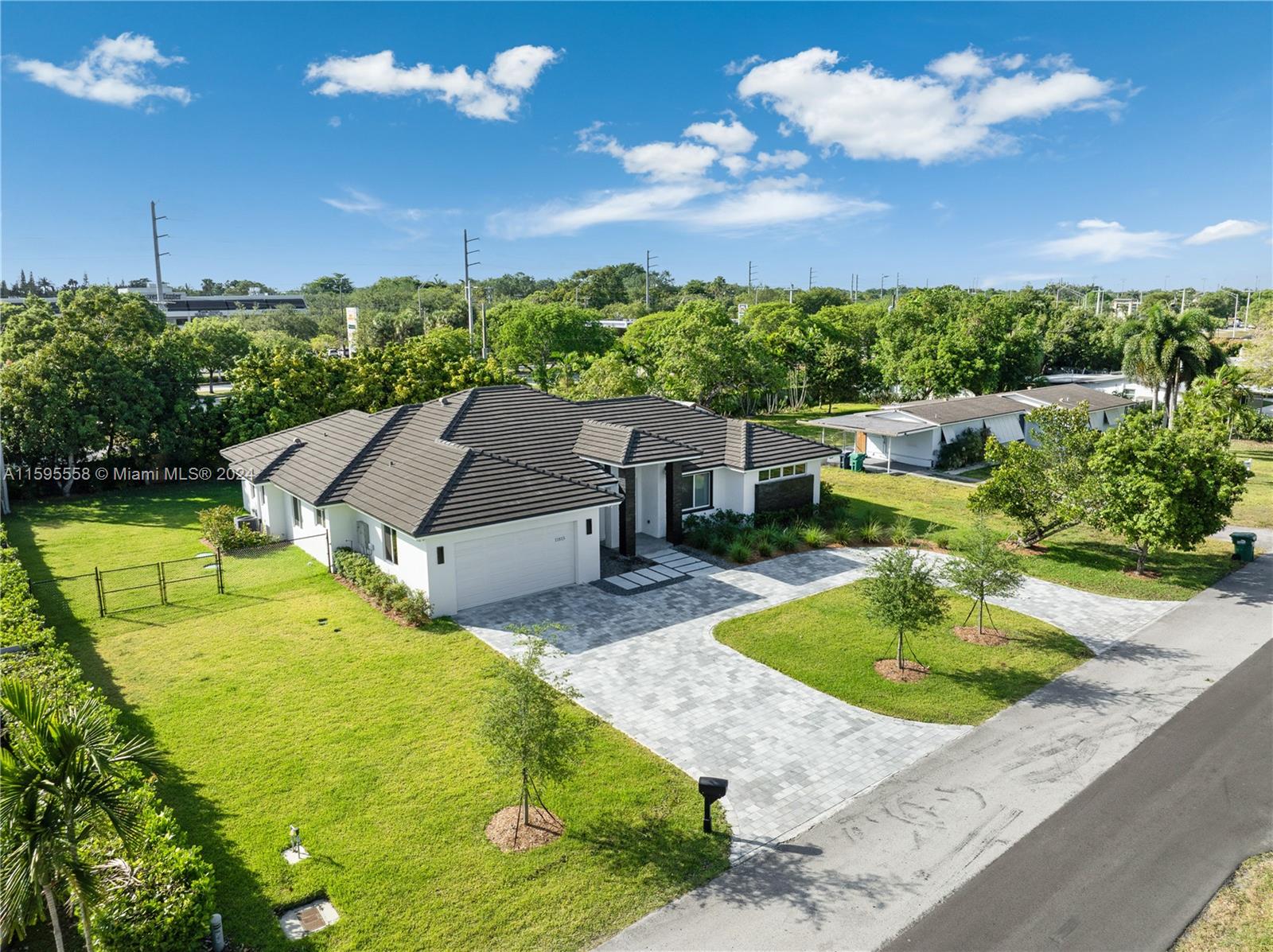 11815 Southwest 82nd Road Miami, FL 33156 - Photo 47 of 47 a view of a swimming pool with a patio