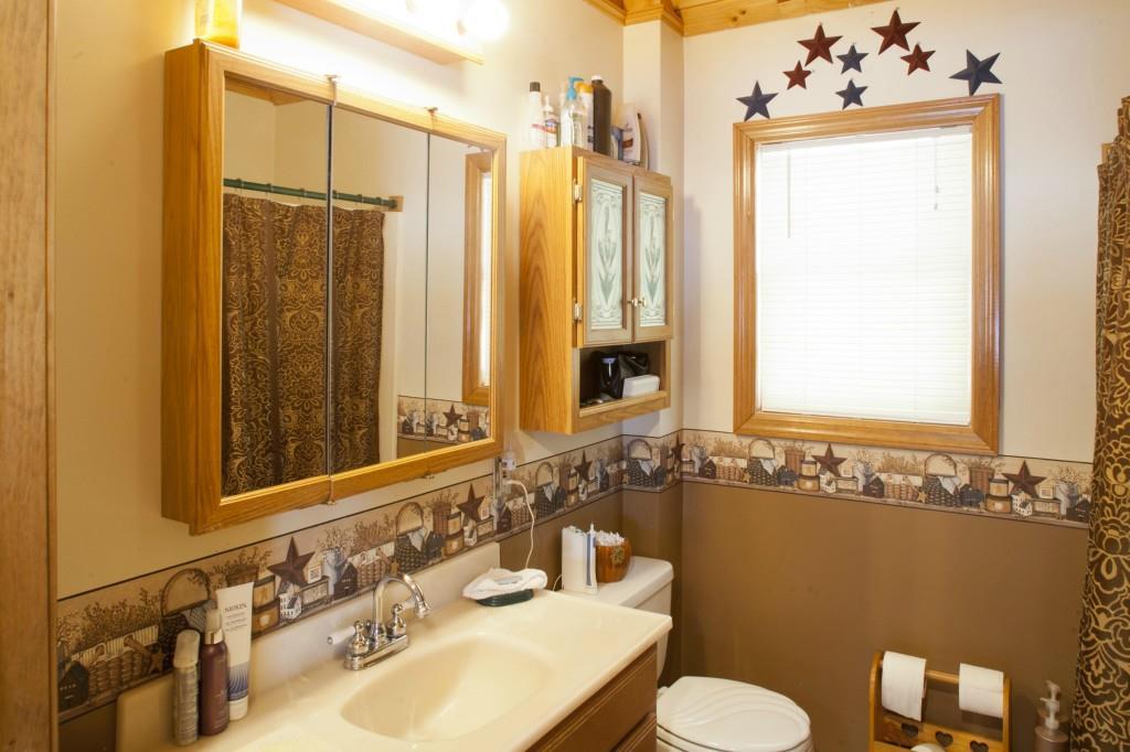 494 Springy Pond Road Ellsworth, ME 04605 - Photo 14 of 34 1st floor full bathroom with ceramic...
