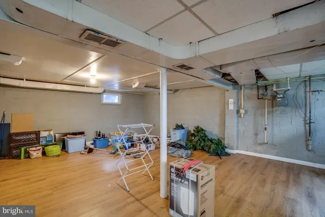 a room with storage and utility room