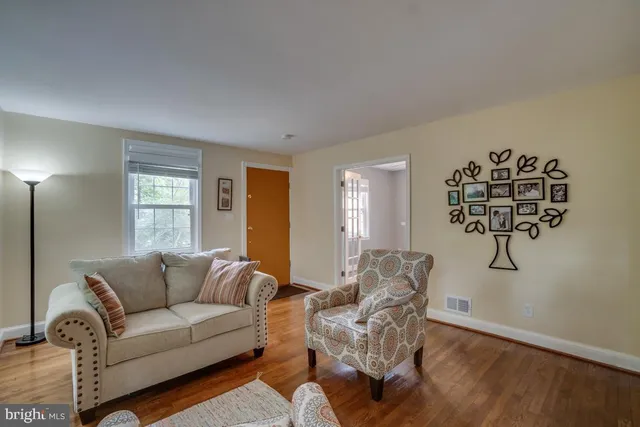 a living room with furniture and window