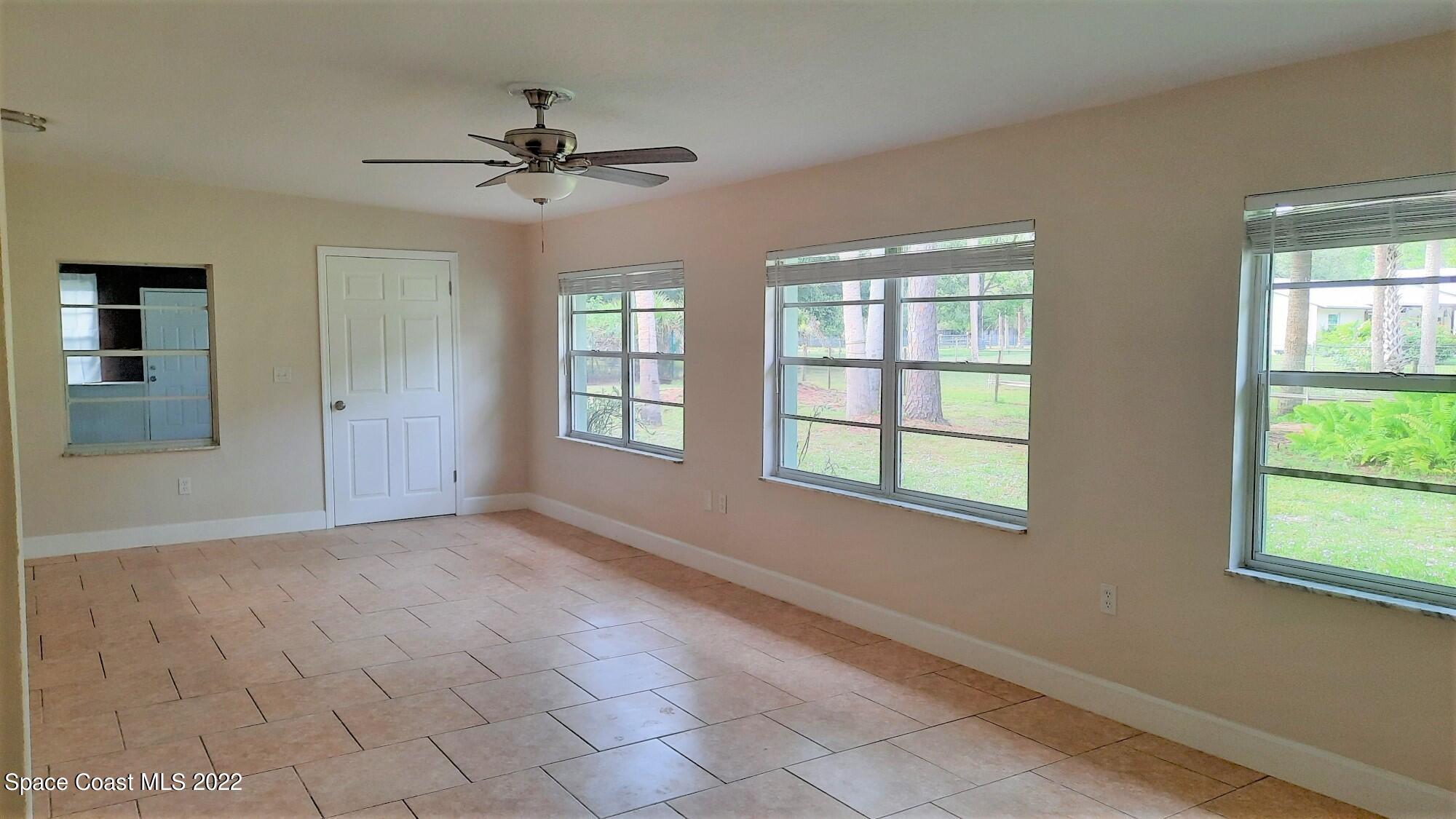 2300 Valkaria Road Malabar, FL 32950 - Photo 12 of 15 a view of an empty room with a window