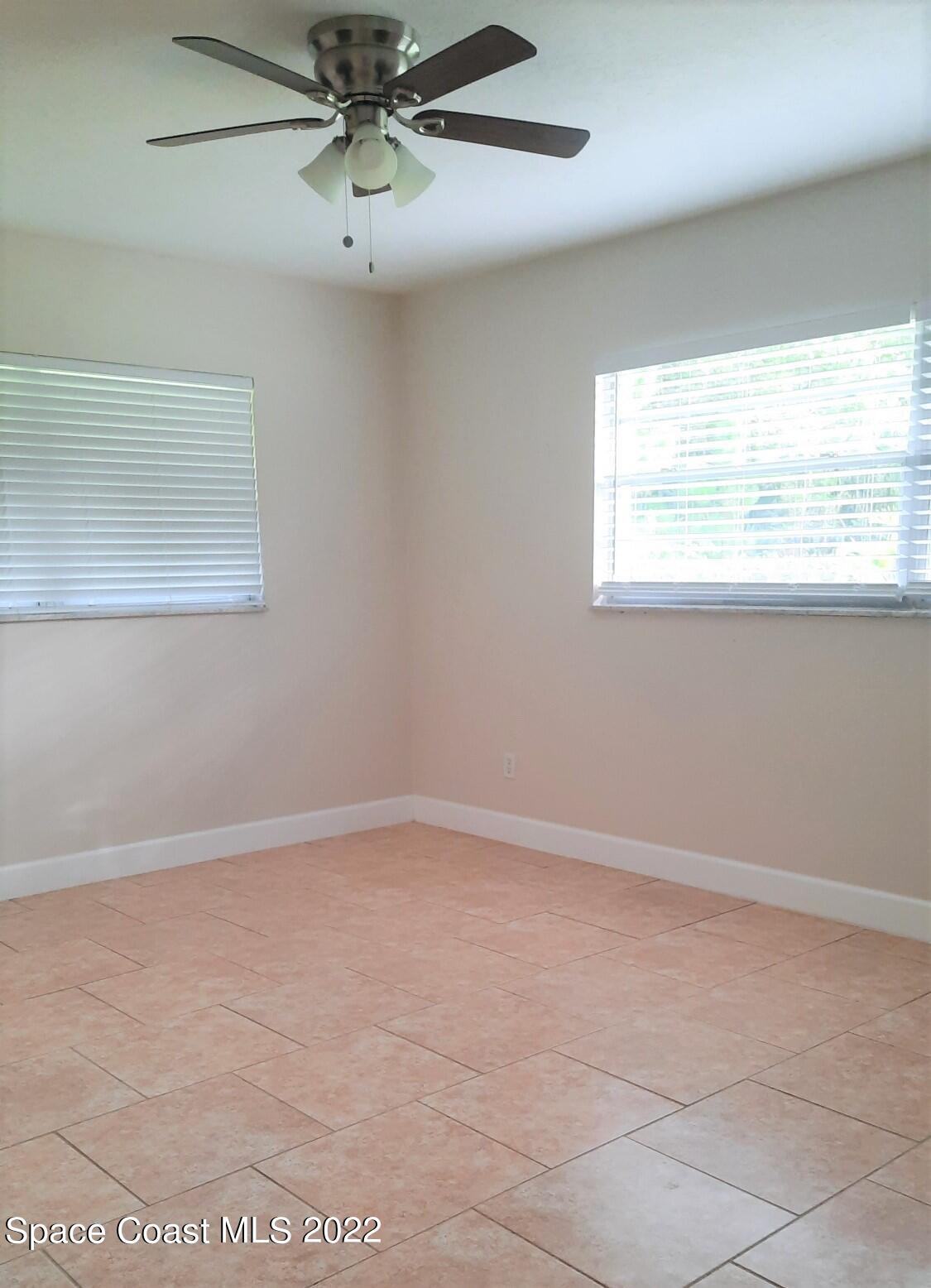 2300 Valkaria Road Malabar, FL 32950 - Photo 7 of 15 a view of an empty room with a window