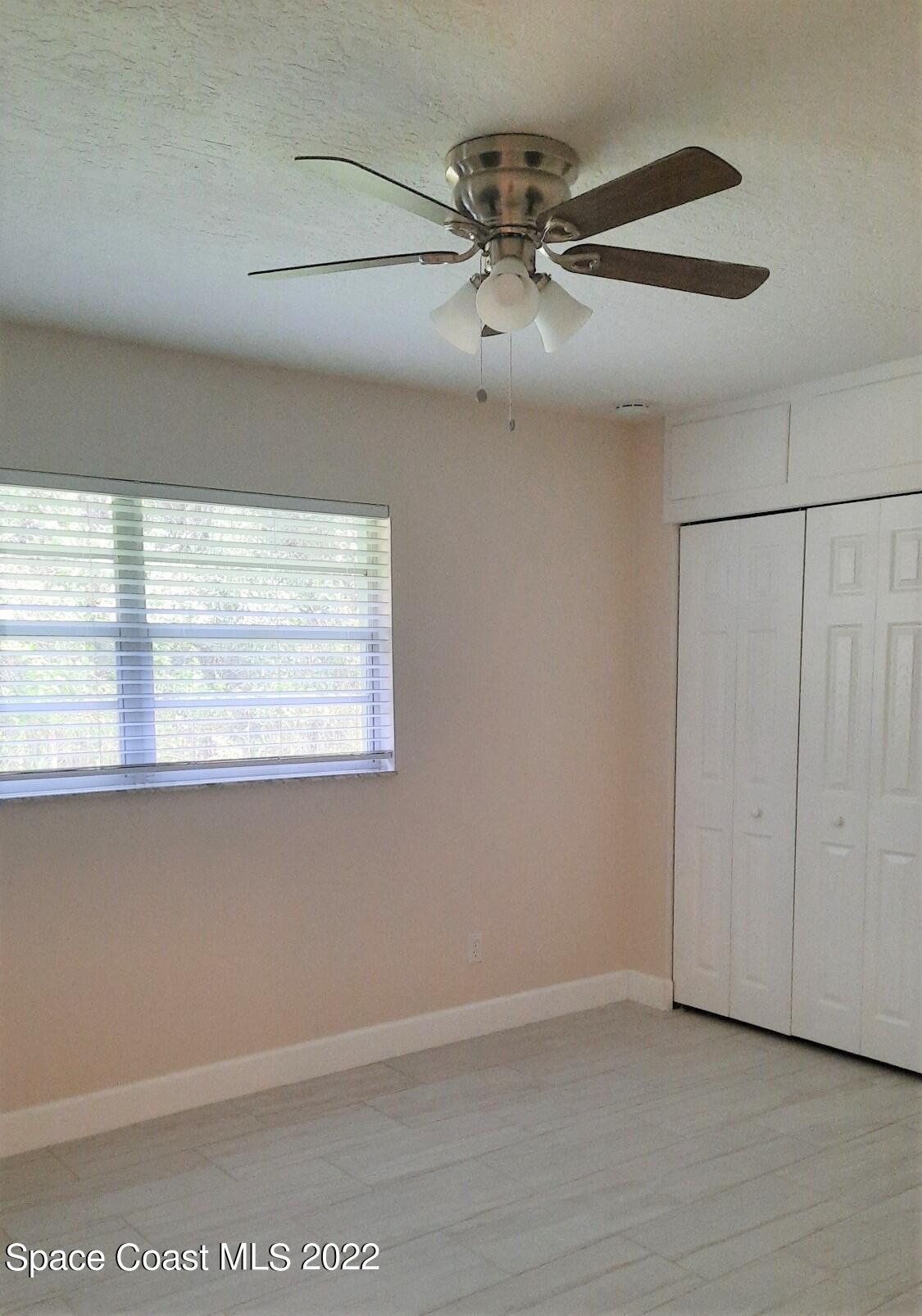 2300 Valkaria Road Malabar, FL 32950 - Photo 10 of 15 a view of an empty room with a window