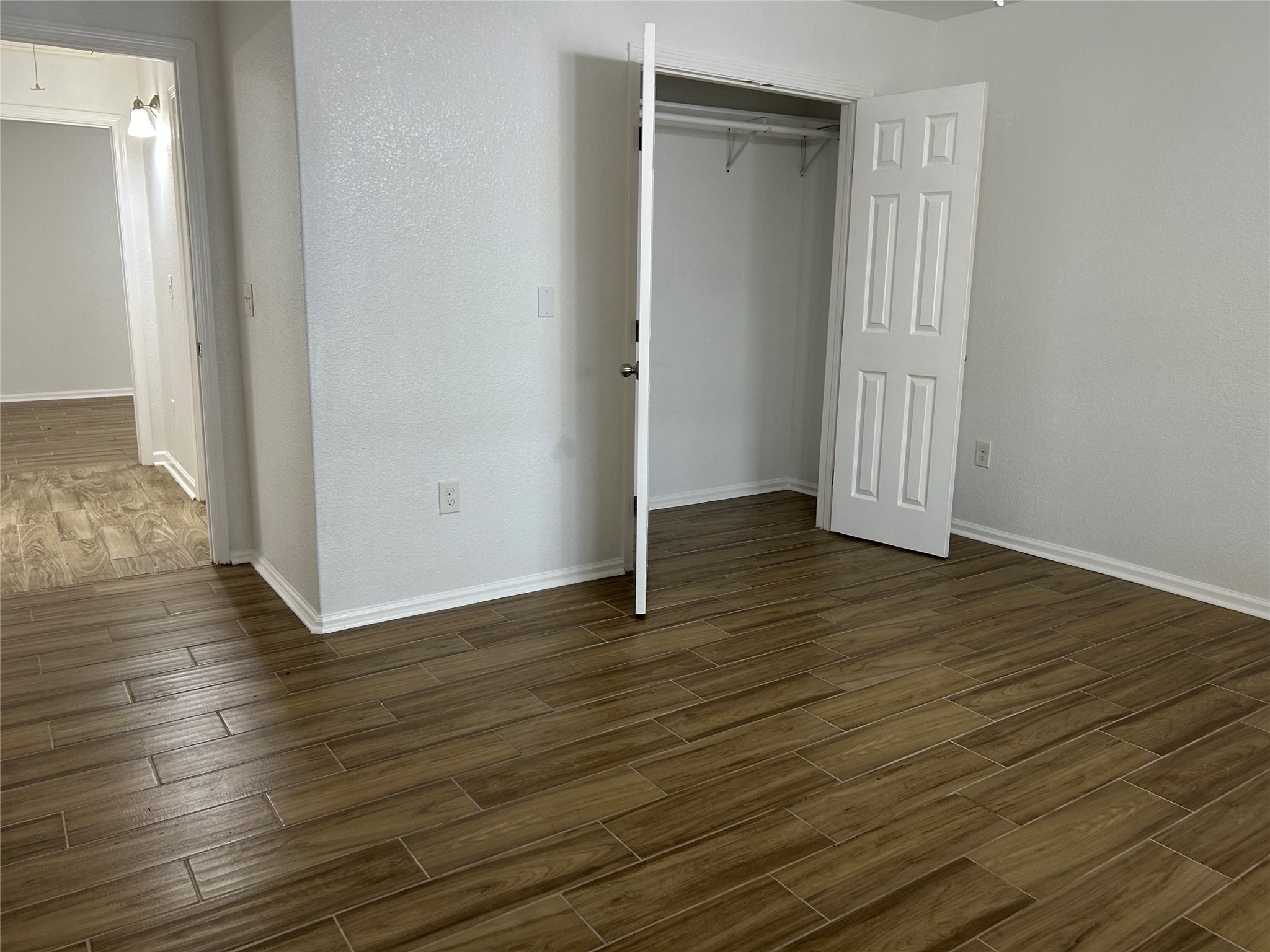 7410 Allsup Street Houston, TX 77061 - Photo 15 of 23 a view of a livingroom with wooden floor