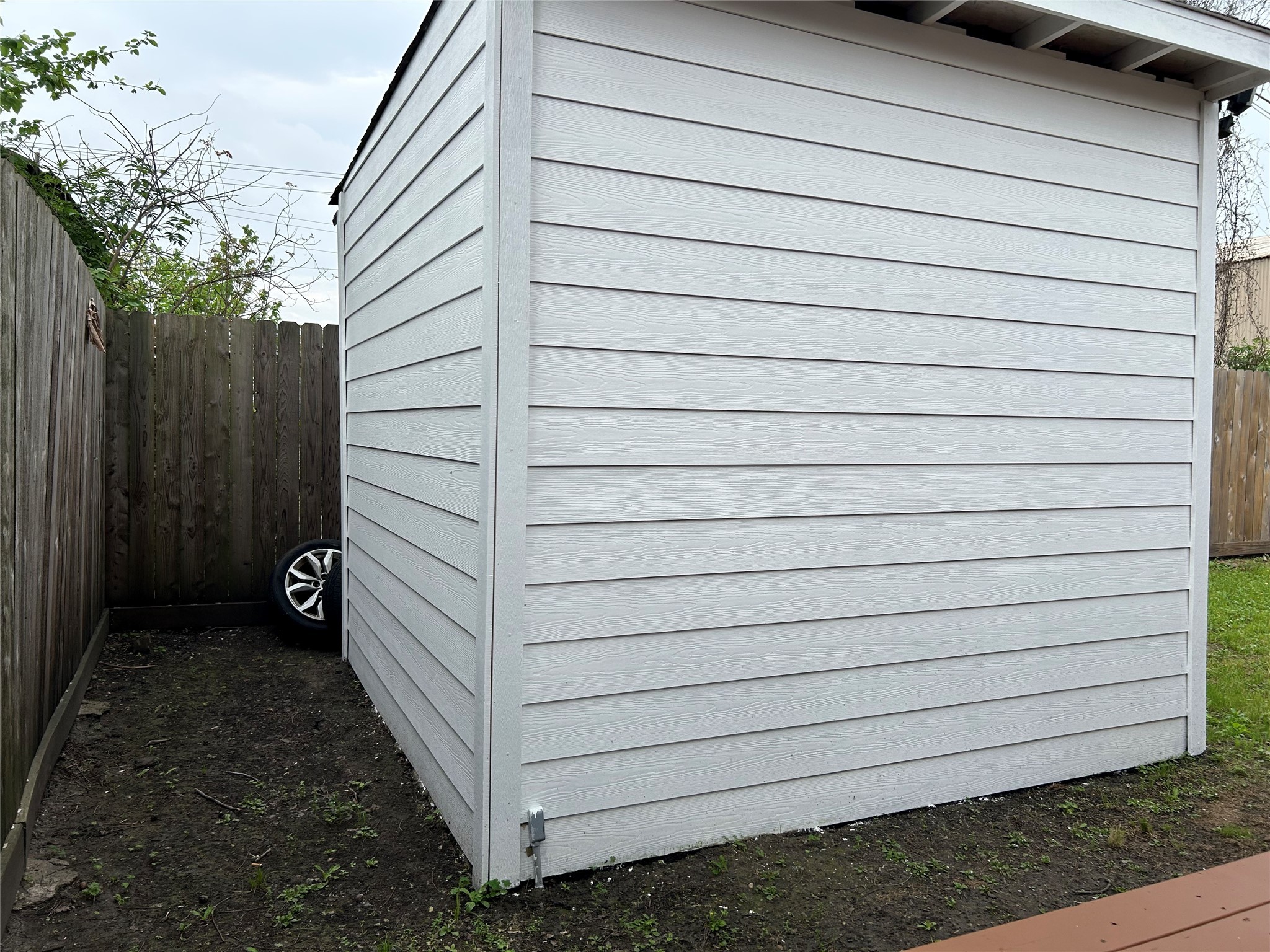 7410 Allsup Street Houston, TX 77061 - Photo 23 of 23 a view of a wooden door