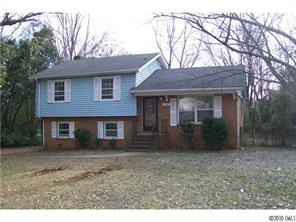 6015 Pepperhill Road Charlotte, NC 28212 - Photo 1 of 12 a front view of a house with a garden