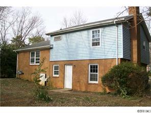 6015 Pepperhill Road Charlotte, NC 28212 - Photo 2 of 12 a view of house with backyard