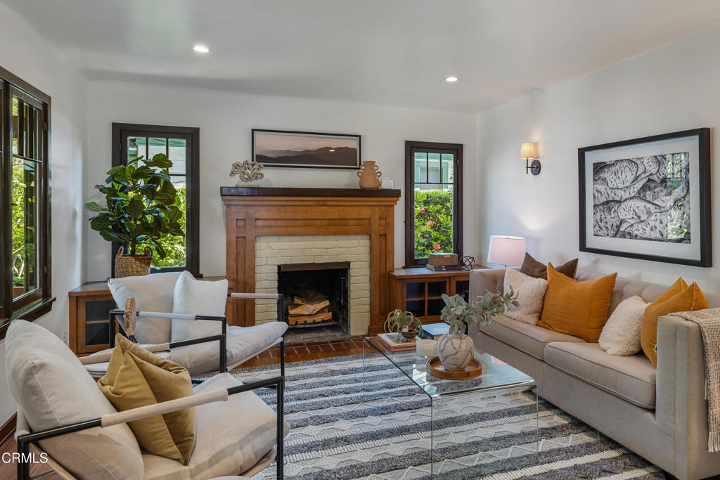 859 Sunset Avenue Pasadena, CA 91103 - Photo 13 of 76 a living room with furniture and a fireplace