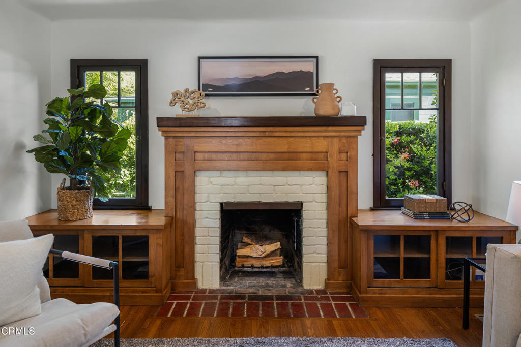 859 Sunset Avenue Pasadena, CA 91103 - Photo 14 of 76 a living room with furniture and a fireplace