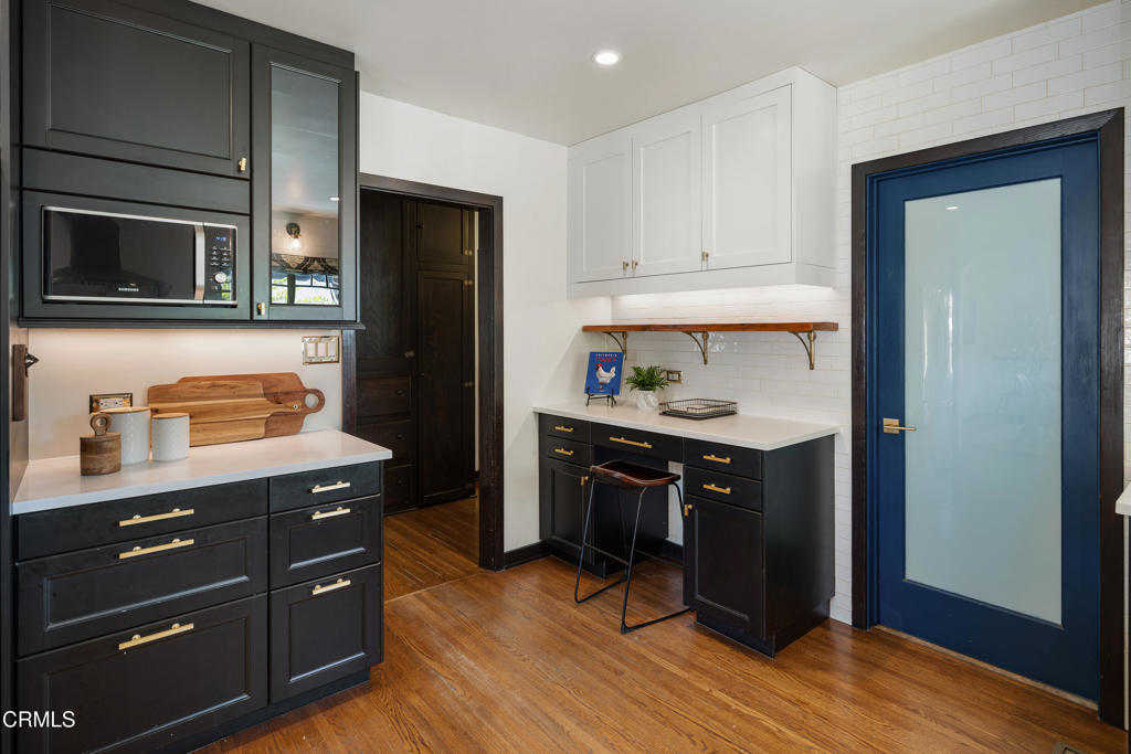 859 Sunset Avenue Pasadena, CA 91103 - Photo 25 of 76 a kitchen with stainless steel appliances granite countertop a refrigerator and a stove top oven