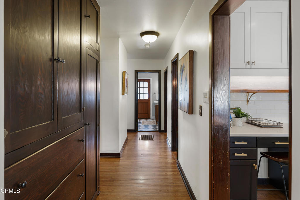 859 Sunset Avenue Pasadena, CA 91103 - Photo 26 of 76 a view of a hallway with wooden floor
