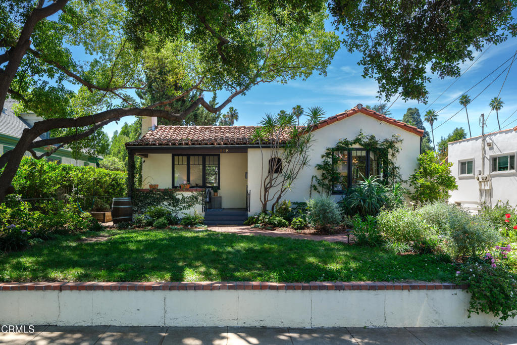 859 Sunset Avenue Pasadena, CA 91103 - Photo 3 of 76 a front view of a house with a yard