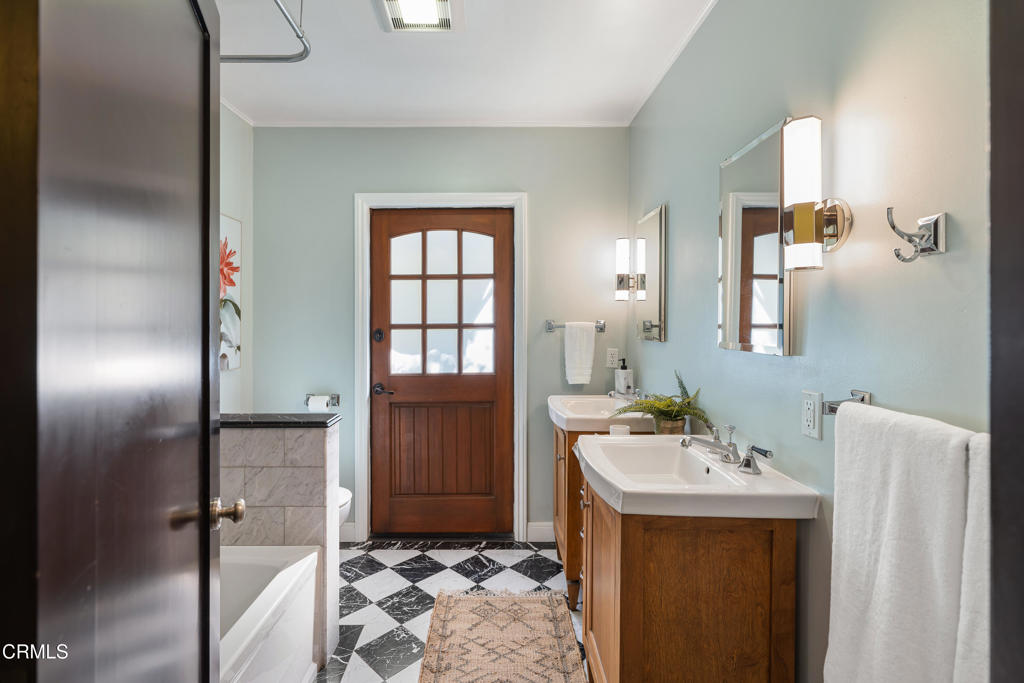 859 Sunset Avenue Pasadena, CA 91103 - Photo 34 of 76 a bathroom with a sink toilet and shower