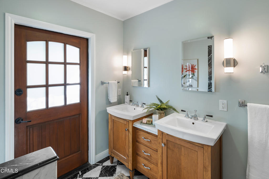 859 Sunset Avenue Pasadena, CA 91103 - Photo 36 of 76 a bathroom with a sink and a window