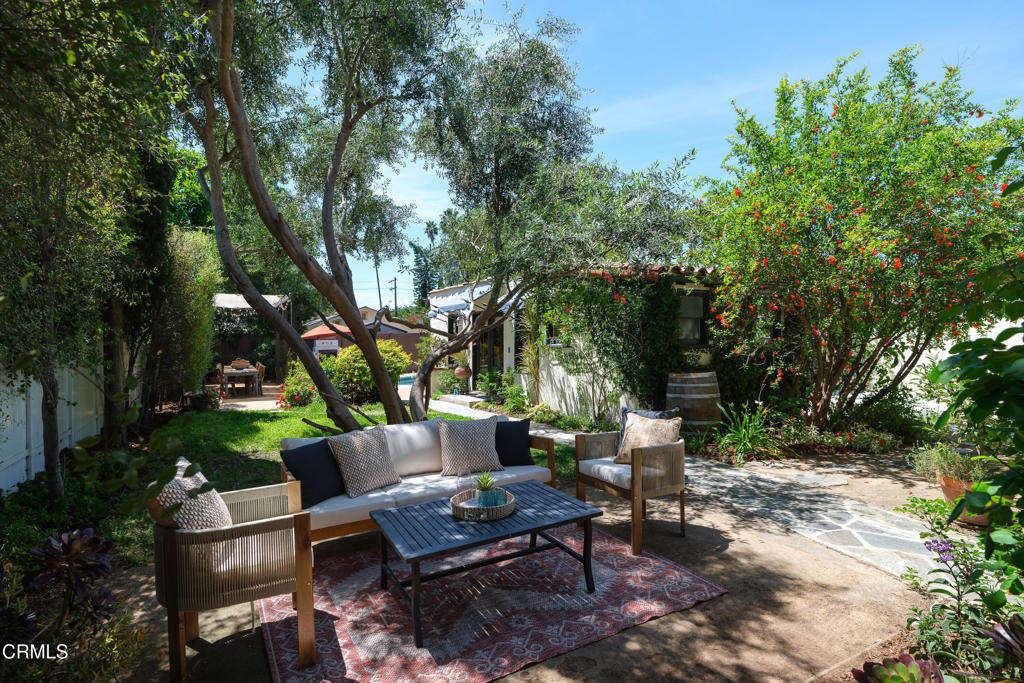 859 Sunset Avenue Pasadena, CA 91103 - Photo 40 of 76 a backyard of a house with outdoor seating