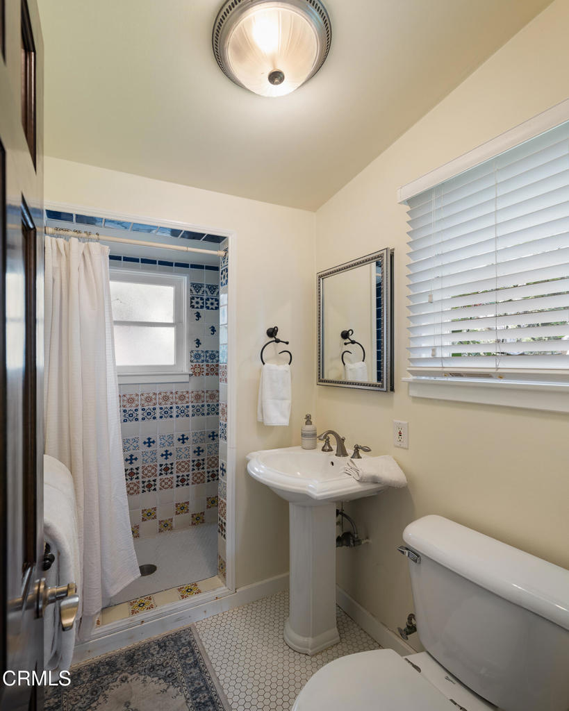 859 Sunset Avenue Pasadena, CA 91103 - Photo 49 of 76 a bathroom with a sink toilet and shower