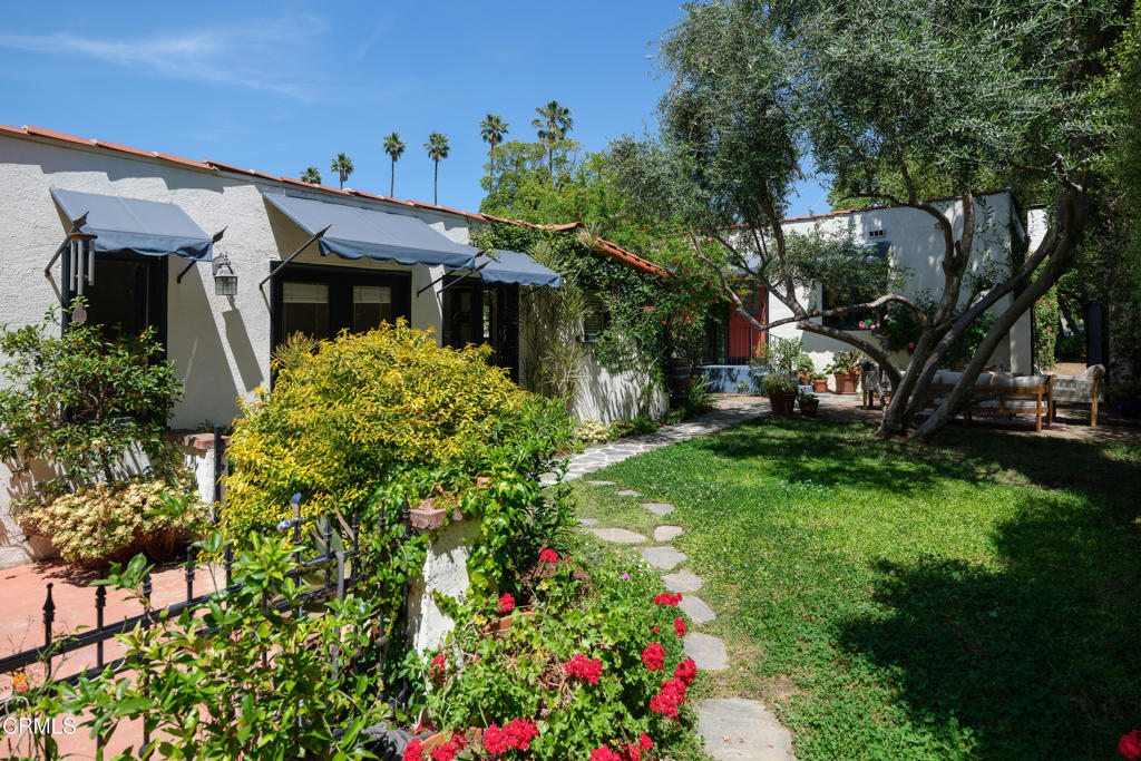 859 Sunset Avenue Pasadena, CA 91103 - Photo 50 of 76 a front view of a house with a yard