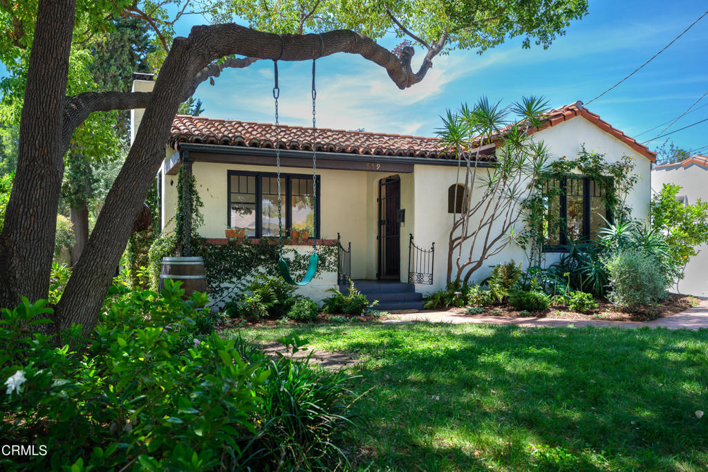 859 Sunset Avenue Pasadena, CA 91103 - Photo 5 of 76 a front view of a house with a yard