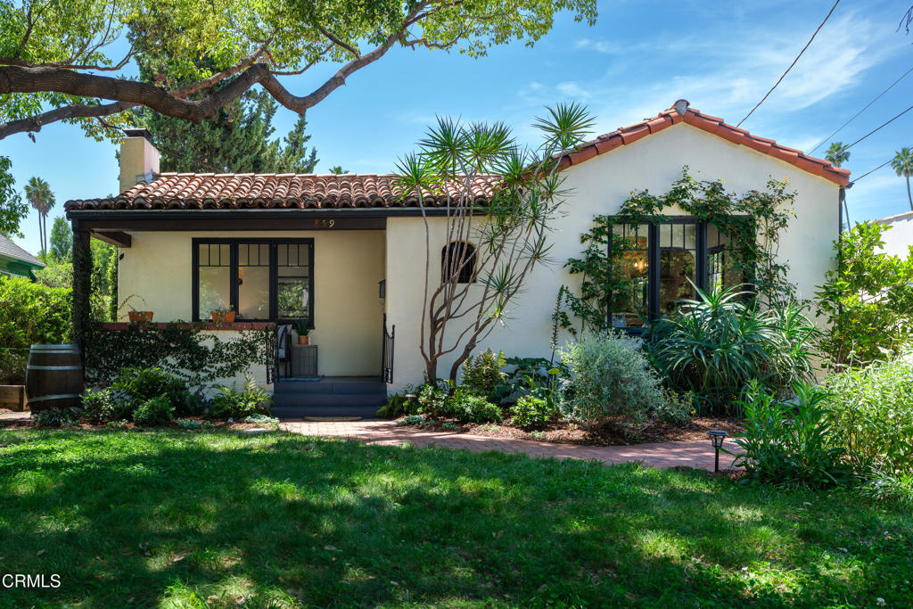 859 Sunset Avenue Pasadena, CA 91103 - Photo 6 of 76 a front view of a house with a yard
