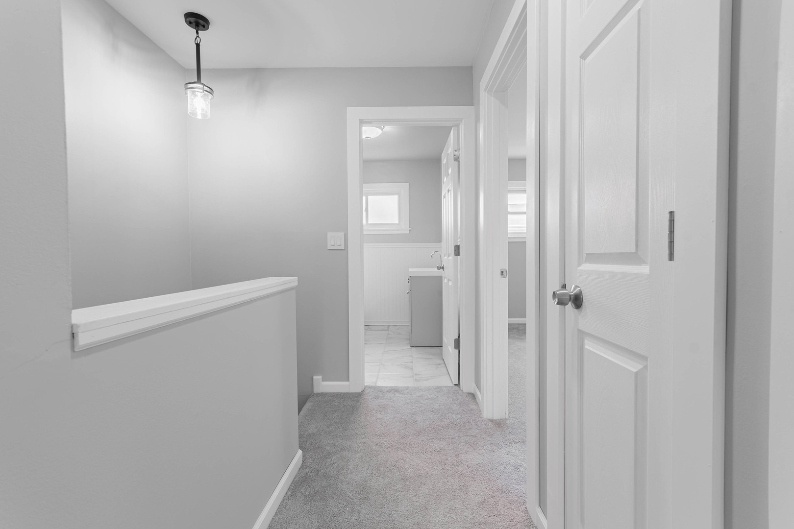 9515 Sumac Road, Unit F Des Plaines, IL 60016 - Photo 13 of 25 a view of a hallway with closet and wooden floor